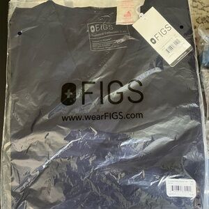 FIGS Three Pocket top. Size XS. NAVY BLUE. Never opened. Never worn.